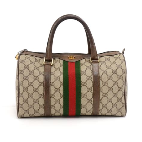 gucci bar accessories vintage|old style vintage gucci bag.